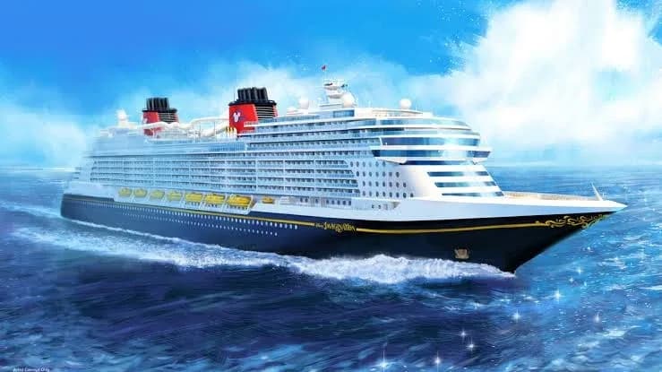 Concept art of the Disney Imagination cruise ship at sea, with a navy hull, gold trim and Mickey-eared red funnels